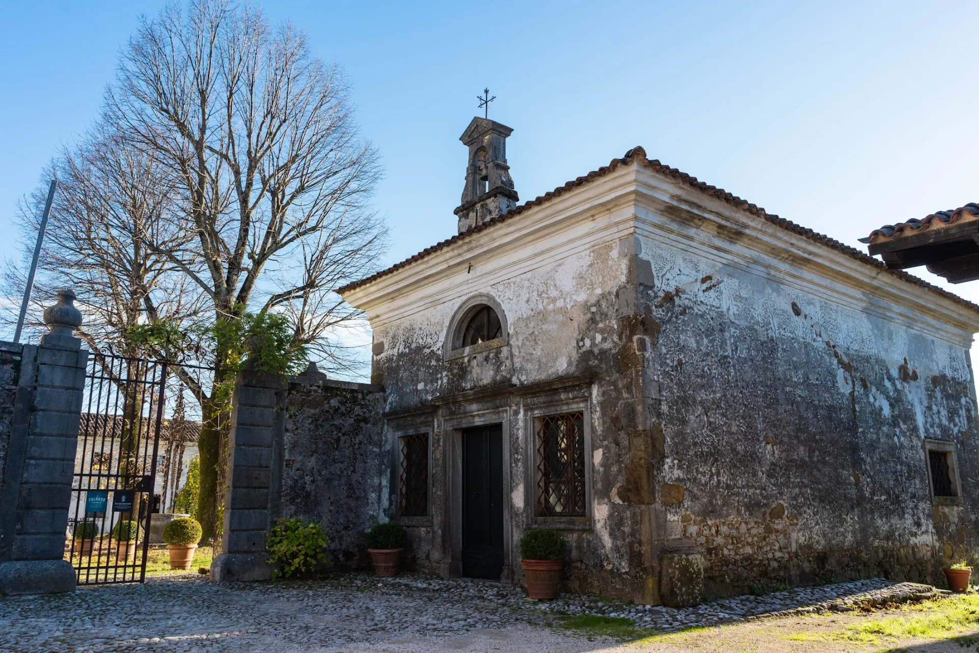 Side facade and bell tower of the private noble chapel at Villa Ottelio
